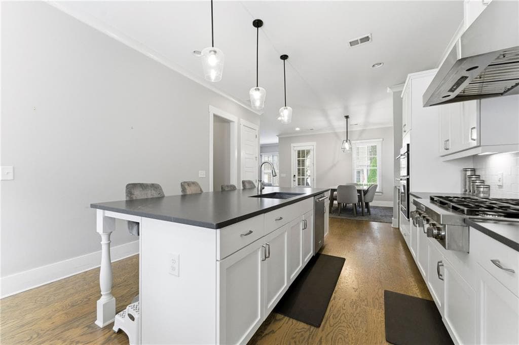 4 bedroom, 4 bathroom, 2,610 sq ft single family residence for sale at 1962 Westside Boulevard, Atlanta, GA 30318 — photo 5