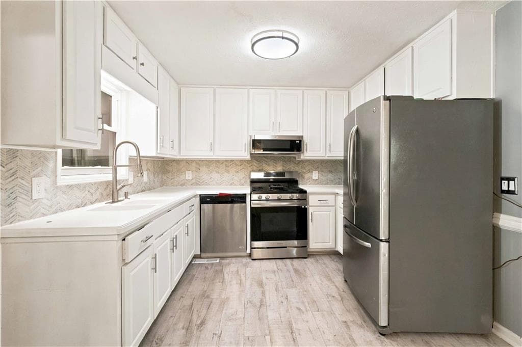 7 bedroom, 3 bathroom, 1,942 sq ft single family residence for sale at 4086 Chapel Hill Road, Douglasville, GA 30135 — photo 7