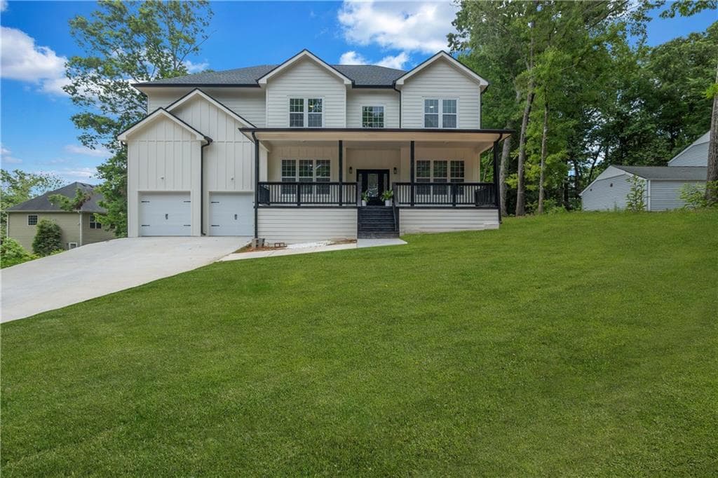 5 bedroom, 4 bathroom, 3,200 sq ft single family residence for sale at 5401 S South Lake Drive, Douglasville, GA 30135 — photo 2