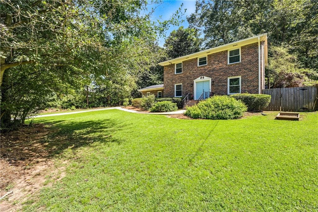 4 bedroom, 3 bathroom, 2,248 sq ft single family residence for sale at 5147 Charmant Place, Atlanta, GA 30360 — photo 2