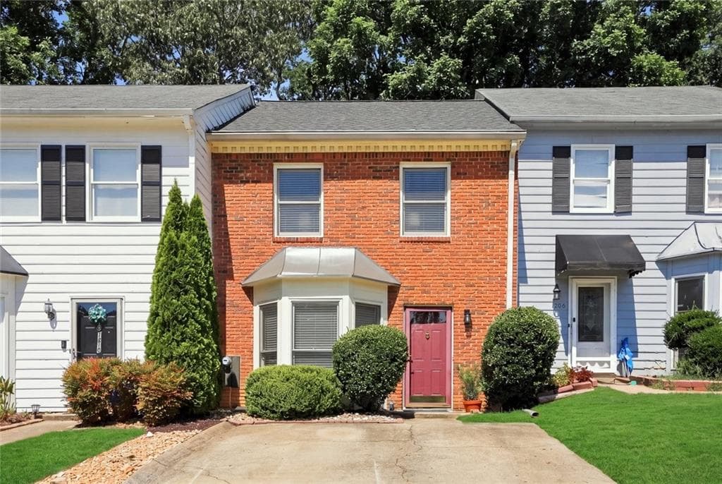 2 bedroom, 3 bathroom, 1,332 sq ft townhouse for sale at 1208 Magnolia Way, Smyrna, GA 30082