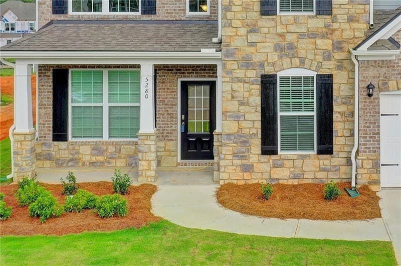 5 bedroom, 4 bathroom, 3,555 sq ft single family residence for sale at 5280 Blue Mountain Lane, Cumming, GA 30040 — photo 4