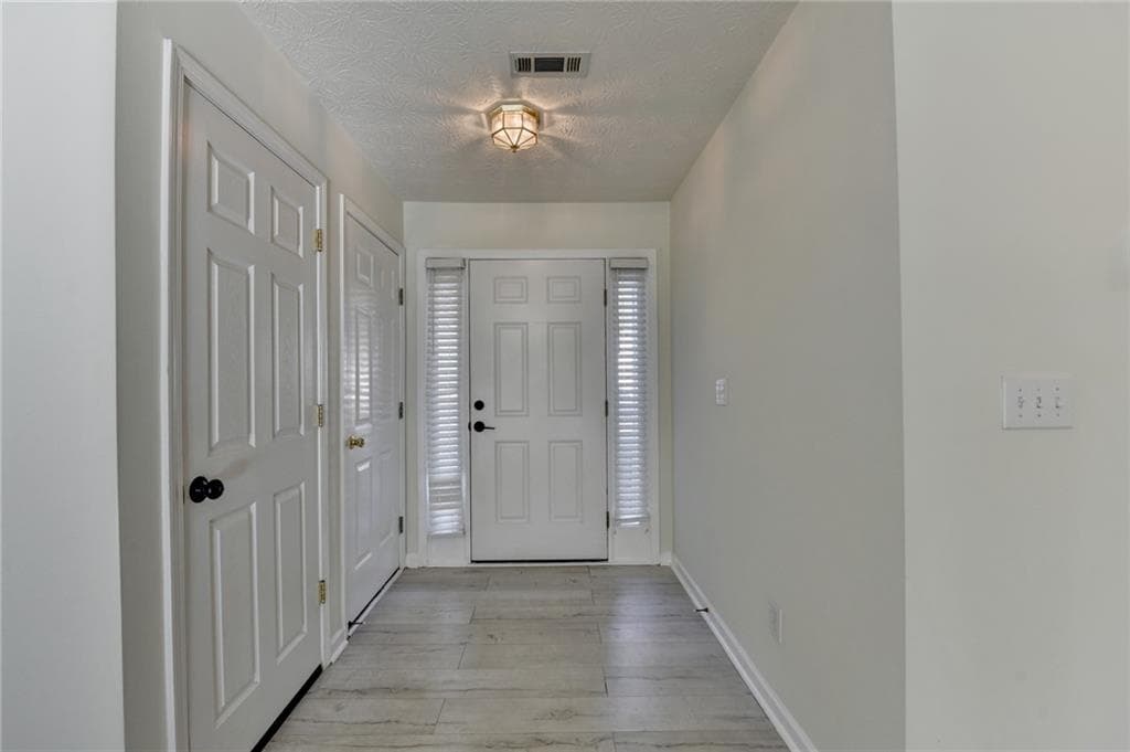 3 bedroom, 2 bathroom, 1,971 sq ft single family residence for sale at 1725 Patrick Mill Place, Buford, GA 30518 — photo 3