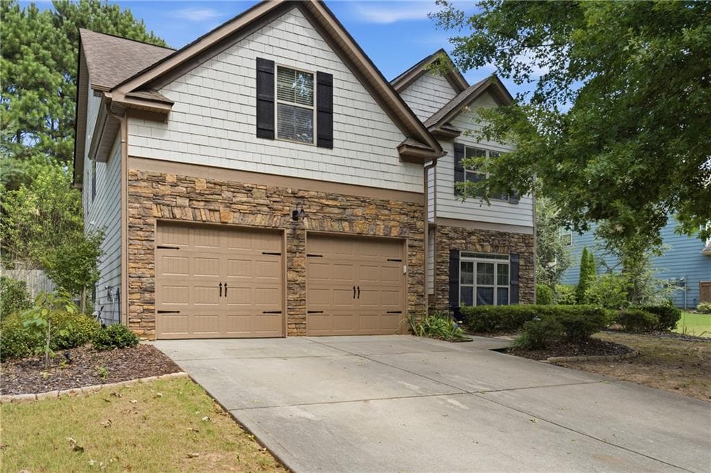 5 bedroom, 3 bathroom, 2,929 sq ft home for sale at 3920 Hunters Walk Way, Cumming, GA