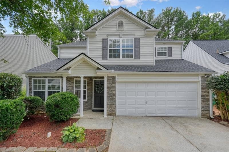 4 bedroom, 3 bathroom, 2,356 sq ft single family residence for sale at 115 Village Trace, Woodstock, GA 30188 — photo 1 of 49