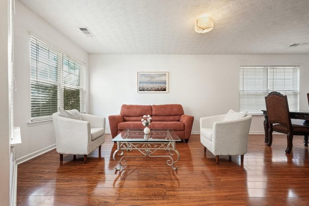 4 bedroom, 3 bathroom, 2,356 sq ft single family residence for sale at 115 Village Trace, Woodstock, GA 30188 — photo 2