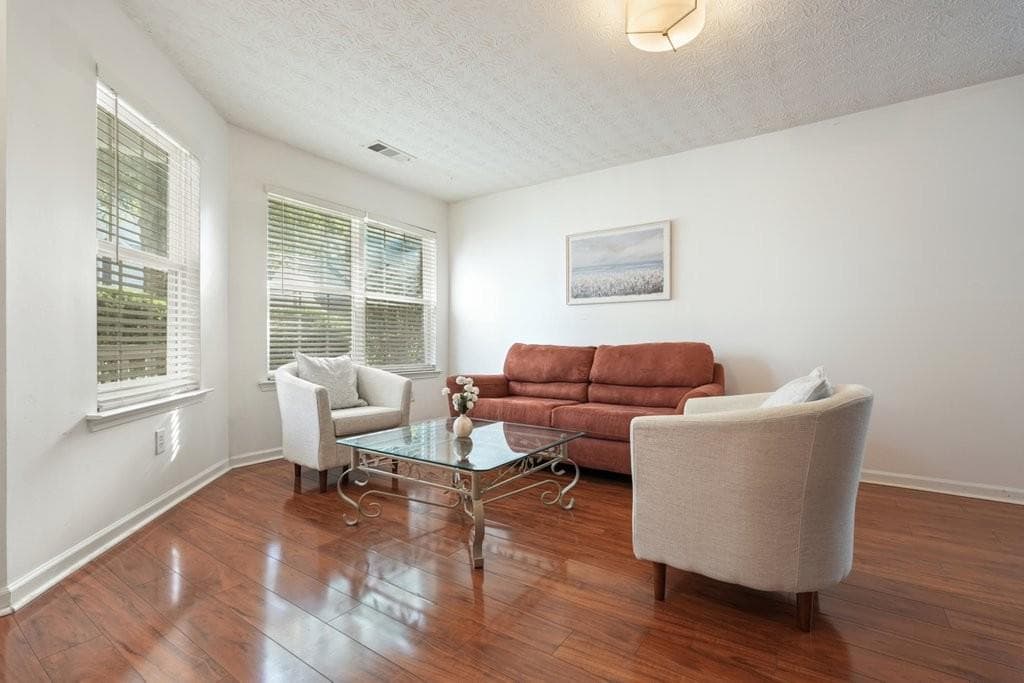 4 bedroom, 3 bathroom, 2,356 sq ft single family residence for sale at 115 Village Trace, Woodstock, GA 30188 — photo 4