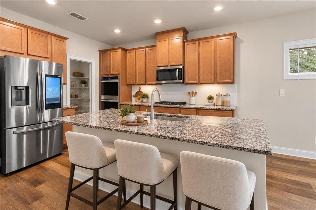 5 bedroom, 3 bathroom, 3,131 sq ft single family residence for sale at 4467 Bethany Manor Drive, Snellville, GA 30039 — photo 4