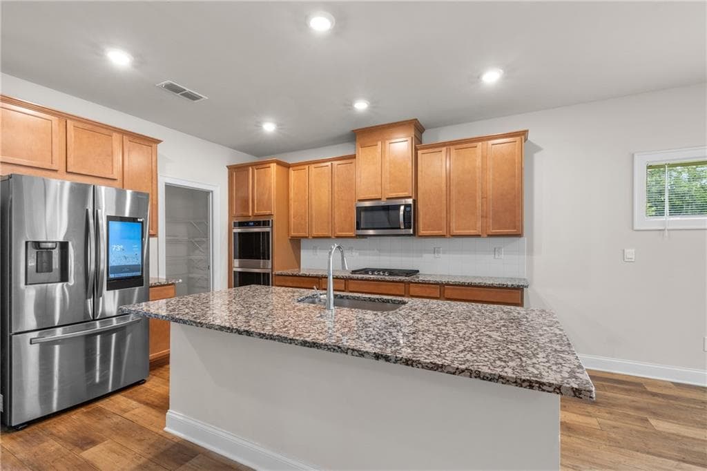 5 bedroom, 3 bathroom, 3,131 sq ft single family residence for sale at 4467 Bethany Manor Drive, Snellville, GA 30039 — photo 5
