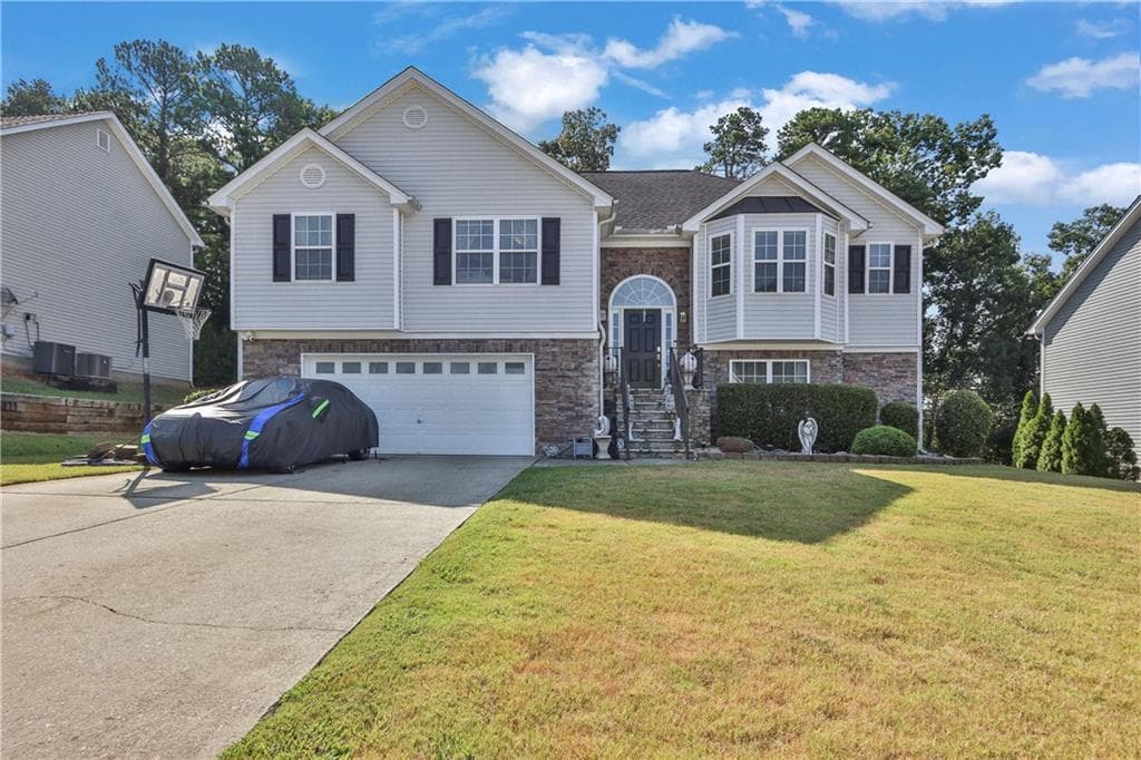 5 bedroom, 3 bathroom, 3,231 sq ft single family residence for sale at 869 Martin Forest Court, Lawrenceville, GA 30045 — photo 1 of 42