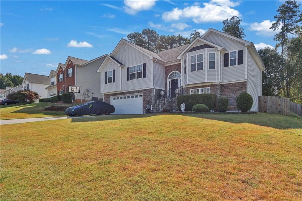 5 bedroom, 3 bathroom, 3,231 sq ft single family residence for sale at 869 Martin Forest Court, Lawrenceville, GA 30045 — photo 2