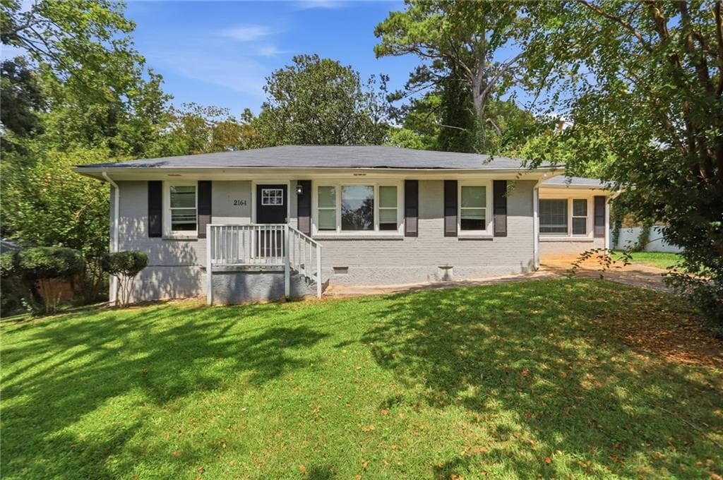 4 bedroom, 1 bathroom, 1,212 sq ft single family residence for sale at 2164 Rockhaven Circle, Decatur, GA 30032 — photo 1 of 34