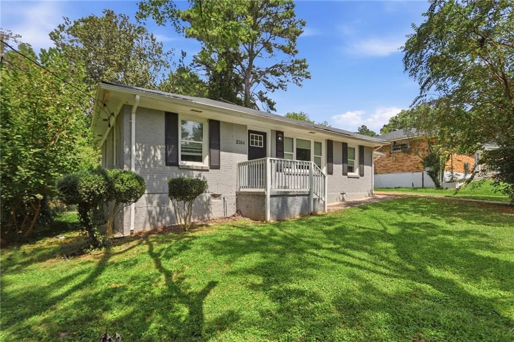 4 bedroom, 1 bathroom, 1,212 sq ft single family residence for sale at 2164 Rockhaven Circle, Decatur, GA 30032 — photo 2