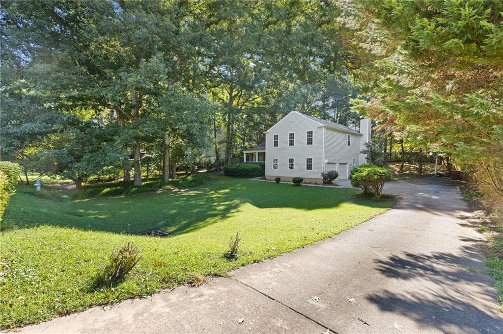 4 bedroom, 3 bathroom, 2,244 sq ft single family residence for sale at 3877 Peachtree Corners Circle, Peachtree Corners, GA 30092 — photo 2