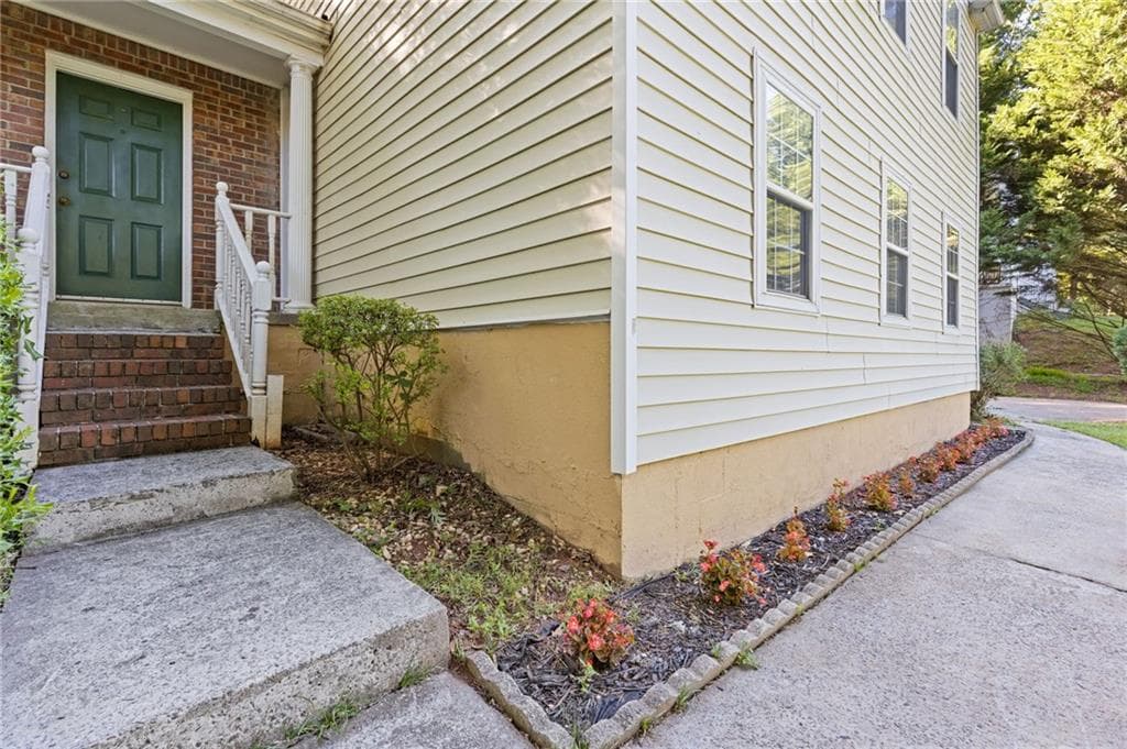 4 bedroom, 3 bathroom, 2,244 sq ft single family residence for sale at 3877 Peachtree Corners Circle, Peachtree Corners, GA 30092 — photo 3