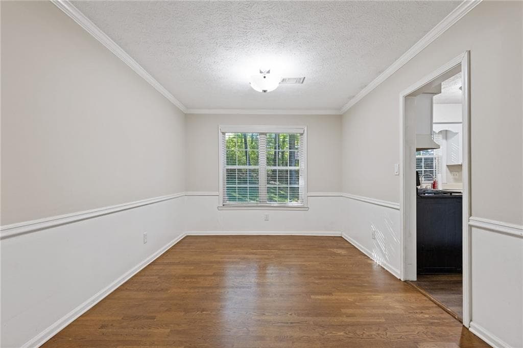 4 bedroom, 3 bathroom, 2,244 sq ft single family residence for sale at 3877 Peachtree Corners Circle, Peachtree Corners, GA 30092 — photo 7