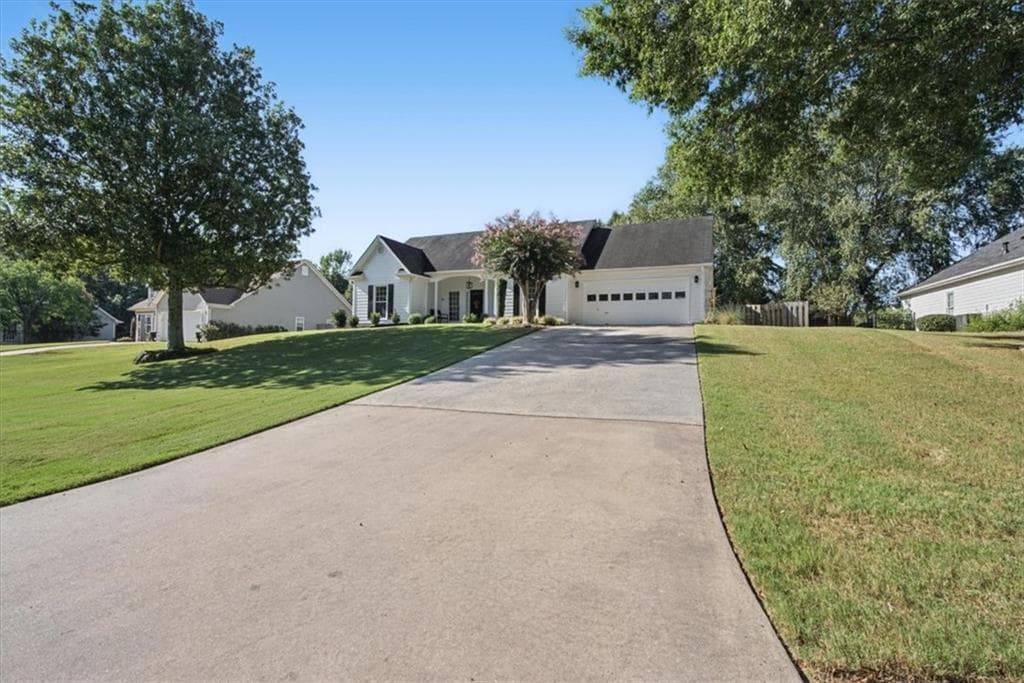 3 bedroom, 2 bathroom, 1,542 sq ft single family residence for sale at 5230 Jonathans Way, Cumming, GA 30040 — photo 4