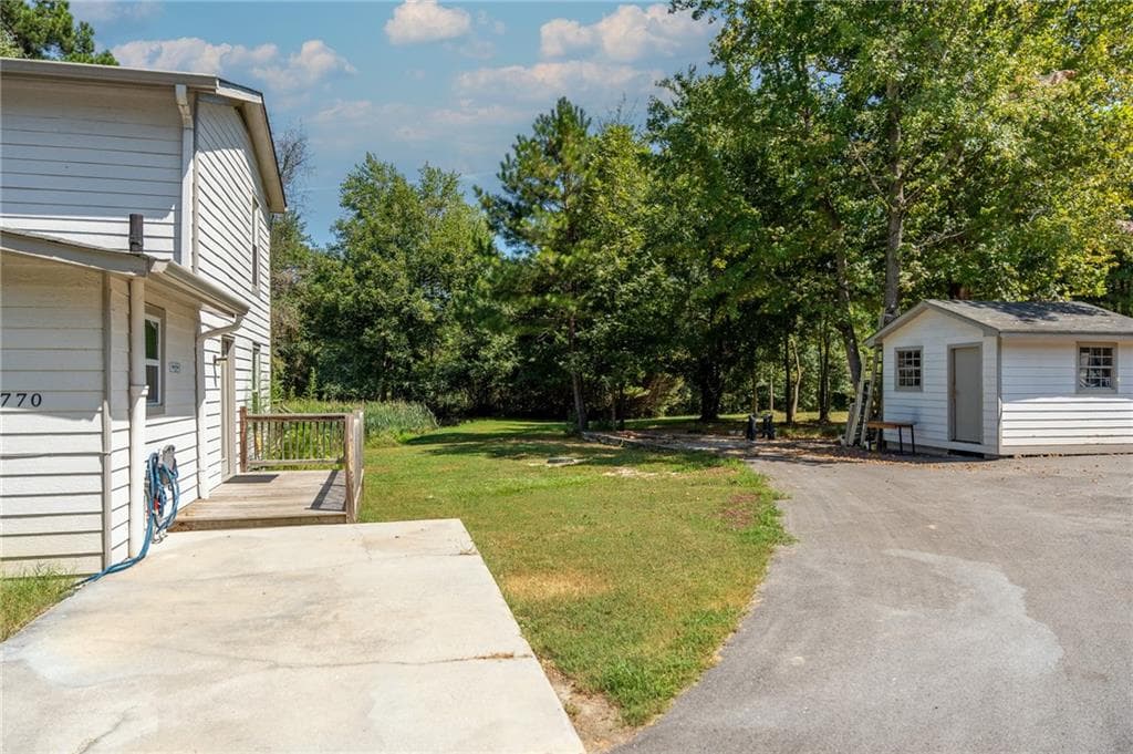 3 bedroom, 2 bathroom, 1,326 sq ft single family residence for sale at 3770 Youth Monroe Road, Loganville, GA 30052 — photo 3
