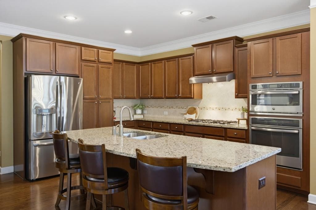6 bedroom, 5 bathroom, 5,932 sq ft single family residence for sale at 870 Grand Reserve Drive, Suwanee, GA 30024 — photo 10