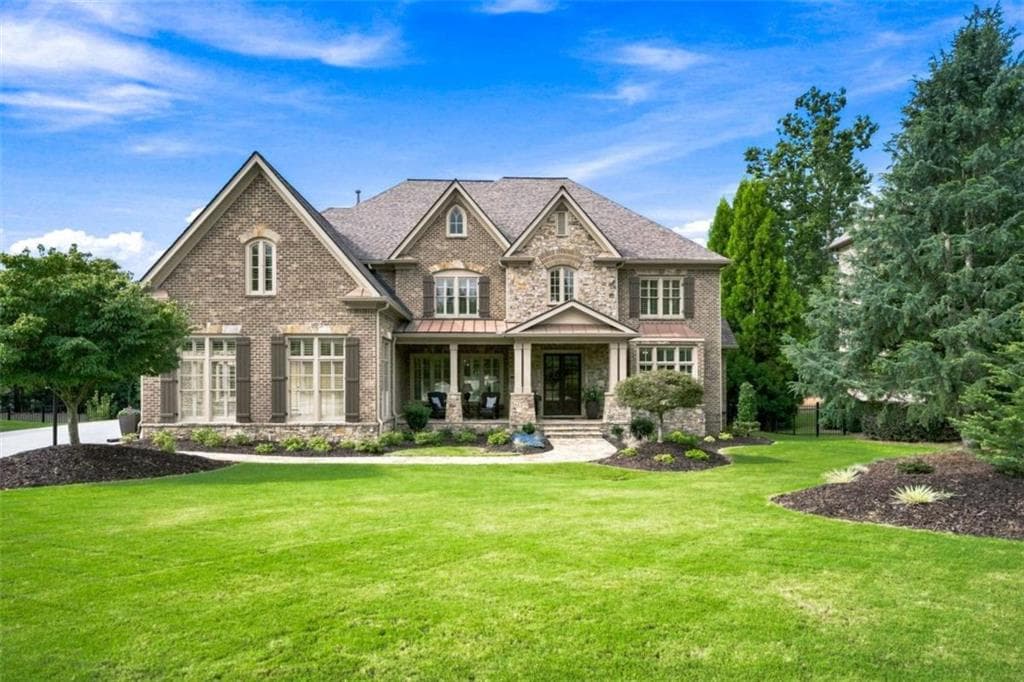 5 bedroom, 7 bathroom, 6,330 sq ft single family residence for sale at 1815 Turnberry Avenue, Suwanee, GA 30024