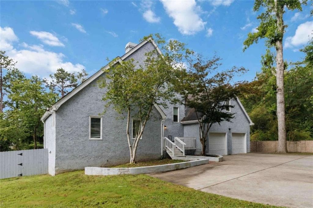 7 bedroom, 4 bathroom, 3,996 sq ft single family residence for sale at 1339 Mundys Mill Road, Jonesboro, GA 30238 — photo 2