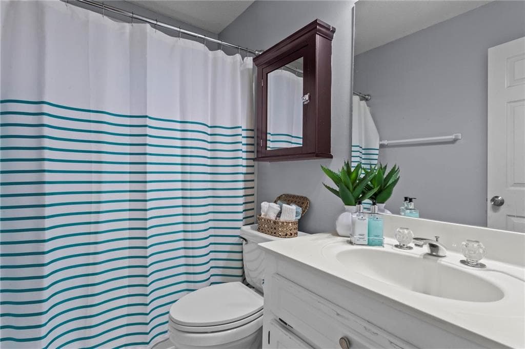 4 bedroom, 3 bathroom, 2,678 sq ft single family residence for sale at 402 Township Lane, Woodstock, GA 30189 — photo 8