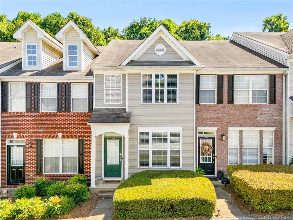 2 bedroom, 3 bathroom, 1,398 sq ft townhouse for sale at 1378 Penhurst Drive, Lawrenceville, GA 30043