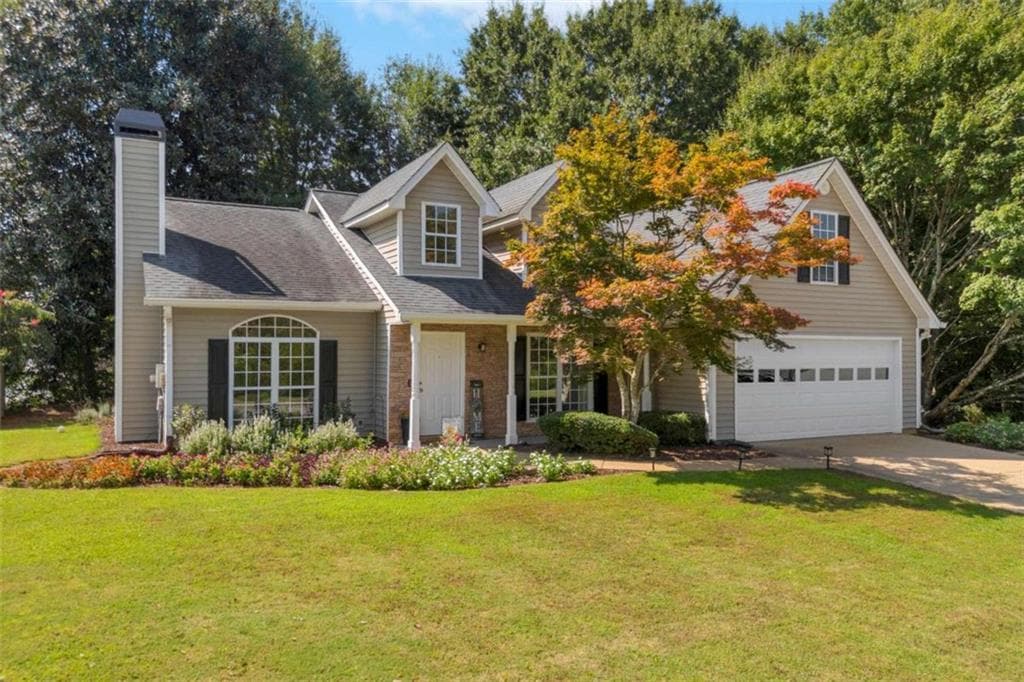 3 bedroom, 2 bathroom, 1,830 sq ft single family residence for sale at 5590 Lenox Park Place, Buford, GA 30518 — photo 2