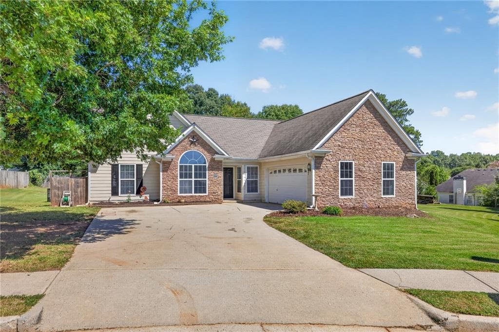 4 bedroom, 2 bathroom, 1,666 sq ft single family residence for sale at 3526 Wimberly Cove Trace, Dacula, GA 30019 — photo 3
