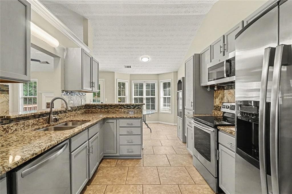5 bedroom, 3 bathroom, 2,500 sq ft single family residence for sale at 524 Martin Forest Lane, Lawrenceville, GA 30045 — photo 3