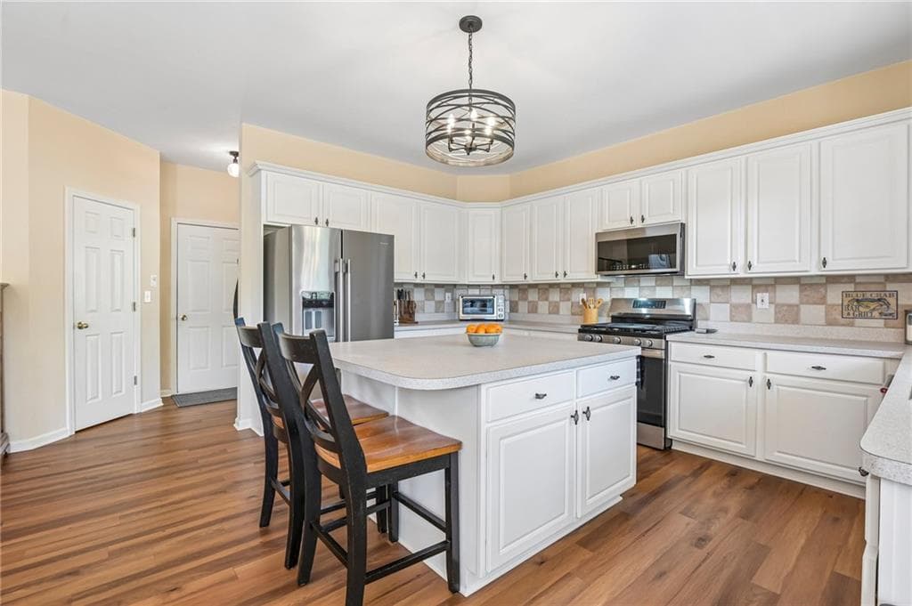 4 bedroom, 3 bathroom, 2,906 sq ft single family residence for sale at 5110 Coventry Creek Drive, Cumming, GA 30040 — photo 6