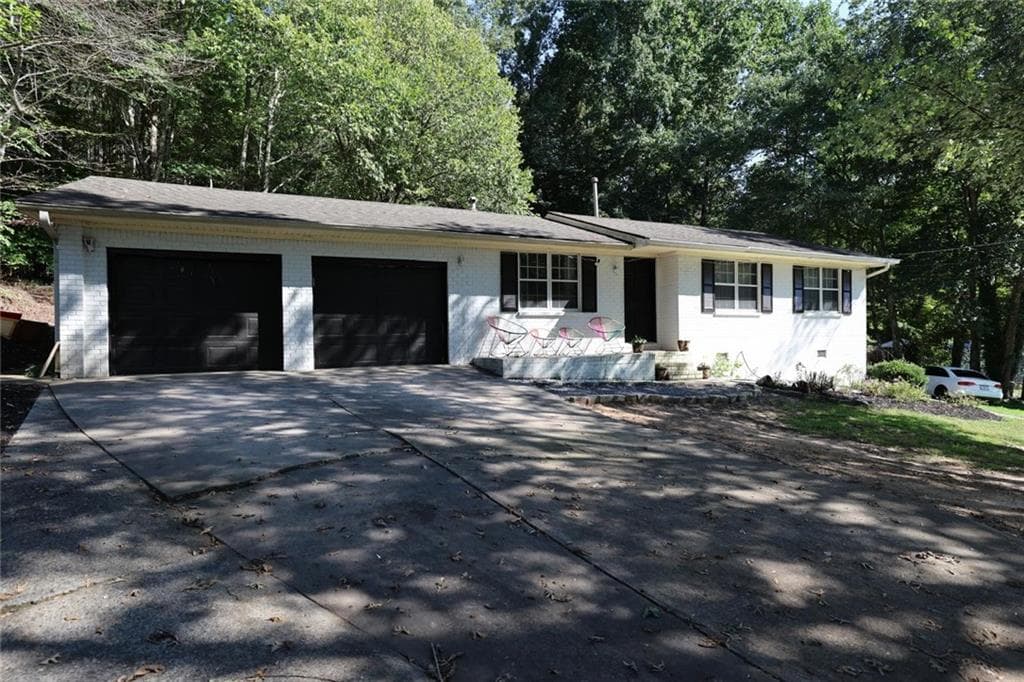 4 bedroom, 2 bathroom, 1,276 sq ft single family residence for sale at 4435 Winding Creek Drive, Cumming, GA 30028 — photo 1 of 30