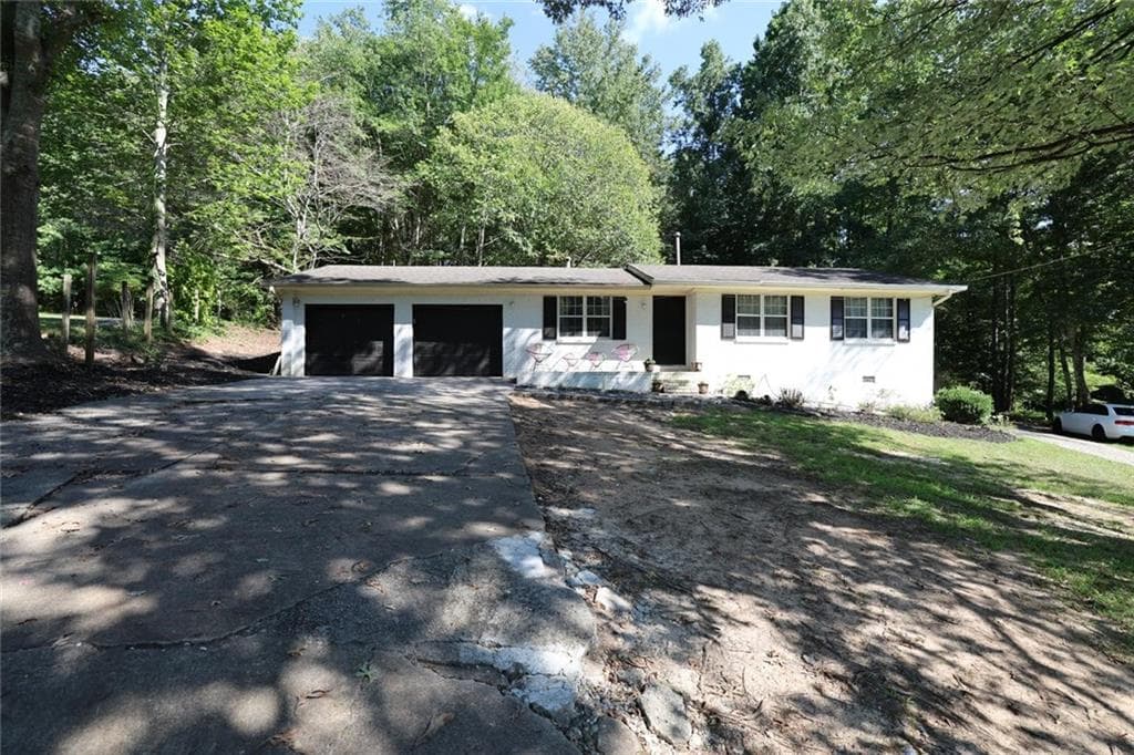 4 bedroom, 2 bathroom, 1,276 sq ft single family residence for sale at 4435 Winding Creek Drive, Cumming, GA 30028 — photo 2