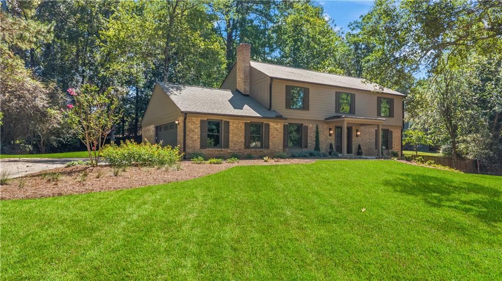 4 bedroom, 3 bathroom, 3,439 sq ft single family residence for sale at 3829 Fox Hills Drive, Marietta, GA 30067 — photo 2