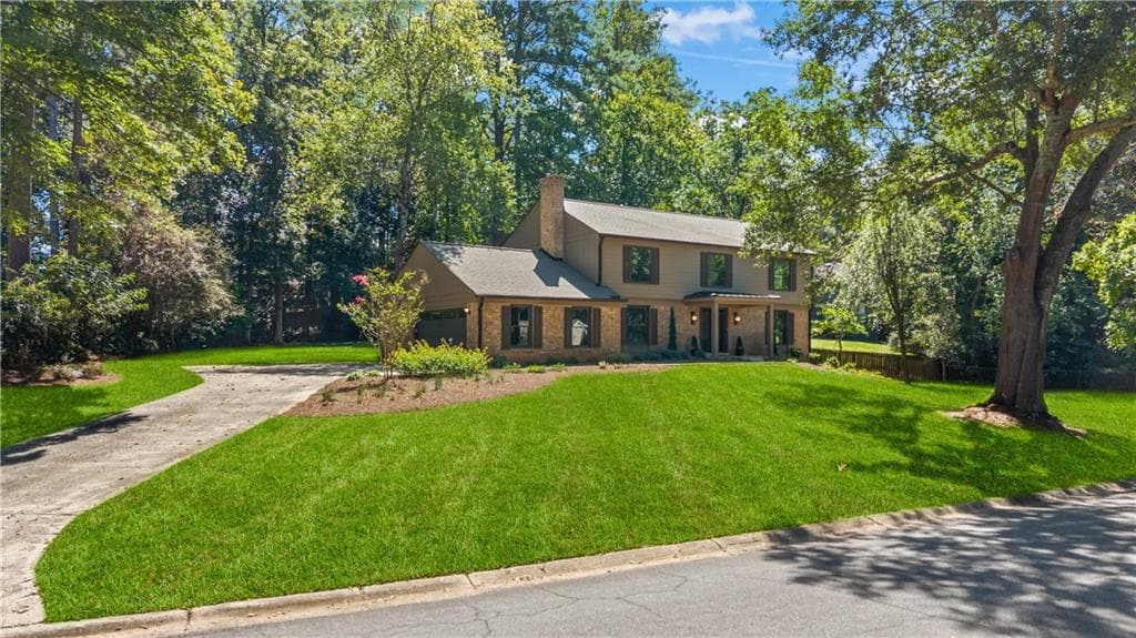 4 bedroom, 3 bathroom, 3,439 sq ft single family residence for sale at 3829 Fox Hills Drive, Marietta, GA 30067 — photo 4