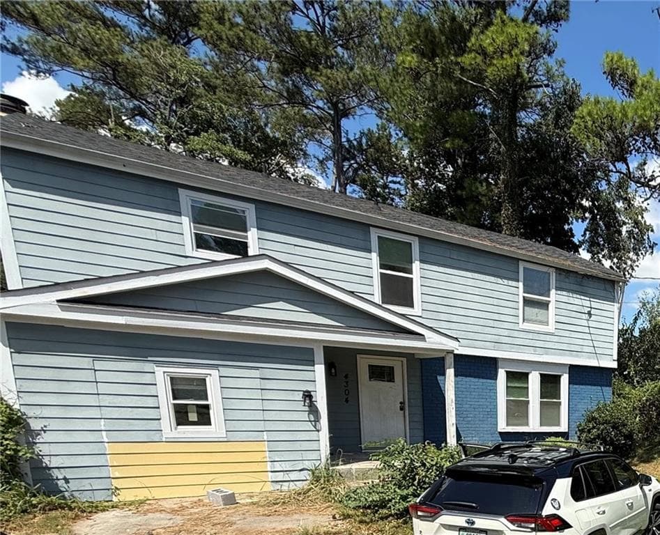 5 bedroom, 4 bathroom, 2,044 sq ft single family residence for sale at 4304 Village Square Lane, Stone Mountain, GA 30083 — photo 1 of 23