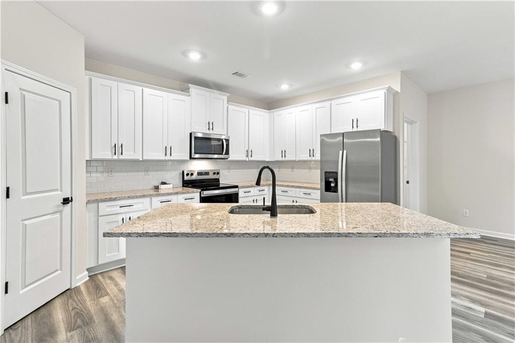 5 bedroom, 3 bathroom, 2,643 sq ft single family residence for sale at 3220 Azteca Way, Dacula, GA 30019 — photo 6
