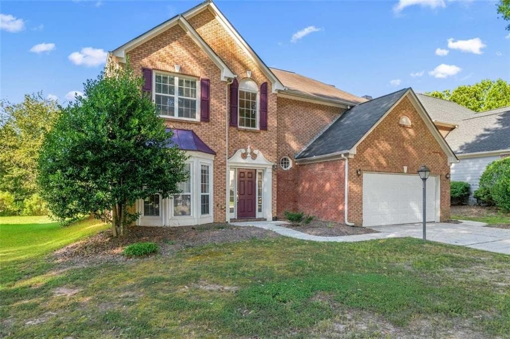 4 bedroom, 3 bathroom, 2,219 sq ft single family residence for sale at 340 Fitzgerald Place, Atlanta, GA 30349 — photo 2