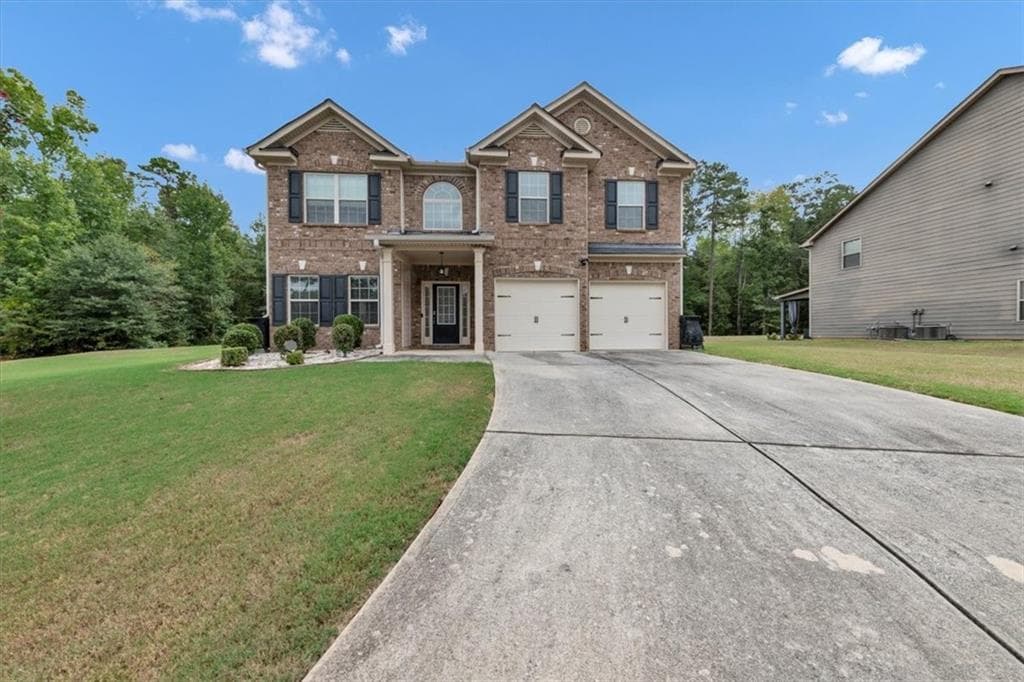 4 bedroom, 3 bathroom, 3,197 sq ft single family residence for sale at 4748 Chickadee Lane, Ellenwood, GA 30294 — photo 2