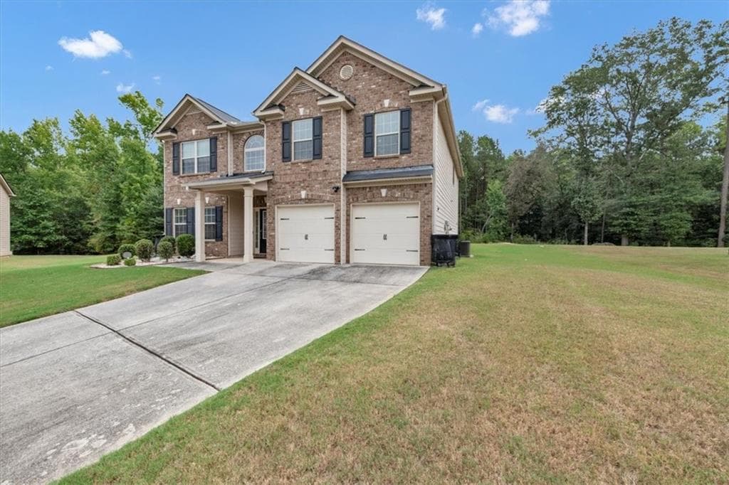 4 bedroom, 3 bathroom, 3,197 sq ft single family residence for sale at 4748 Chickadee Lane, Ellenwood, GA 30294 — photo 4