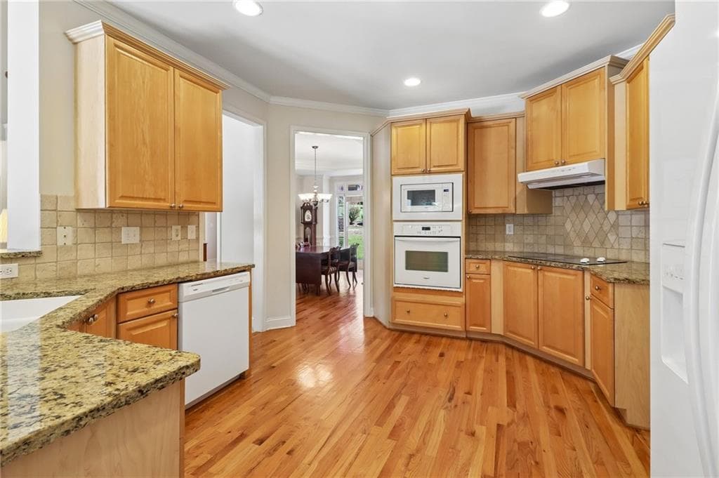 5 bedroom, 3 bathroom, 2,813 sq ft single family residence for sale at 5350 Mcintosh Drive, Cumming, GA 30040 — photo 6