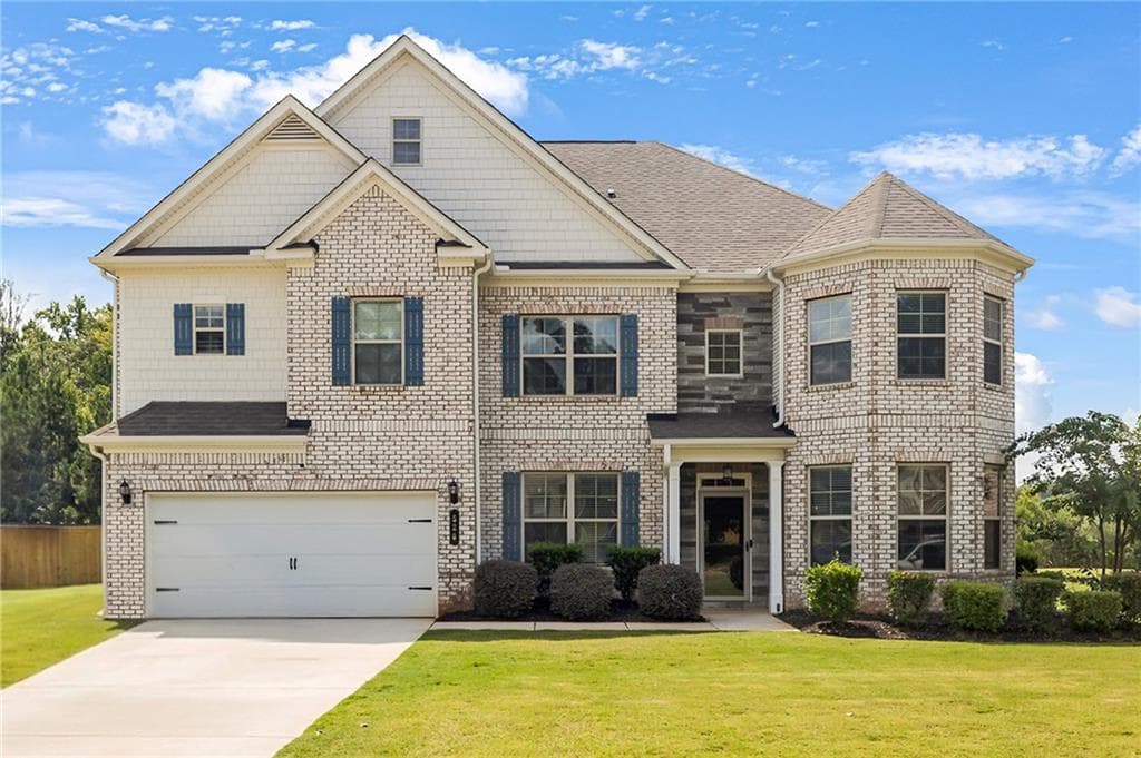 6 bedroom, 4 bathroom, 3,999 sq ft single family residence for sale at 520 Coventry Way, Mcdonough, GA 30252 — photo 1 of 44
