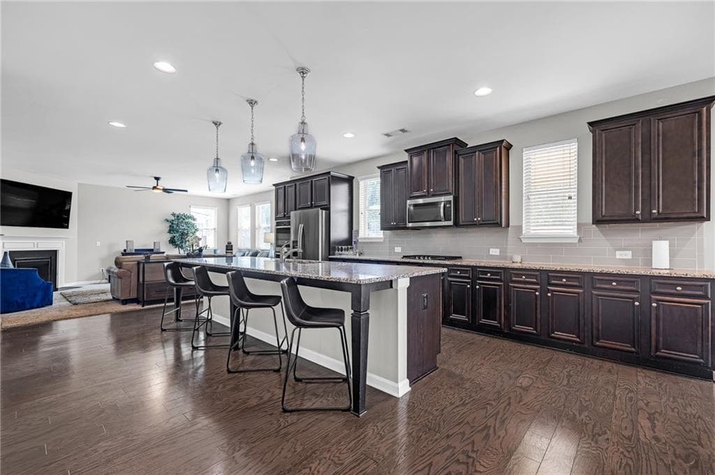 6 bedroom, 4 bathroom, 3,999 sq ft single family residence for sale at 520 Coventry Way, Mcdonough, GA 30252 — photo 9