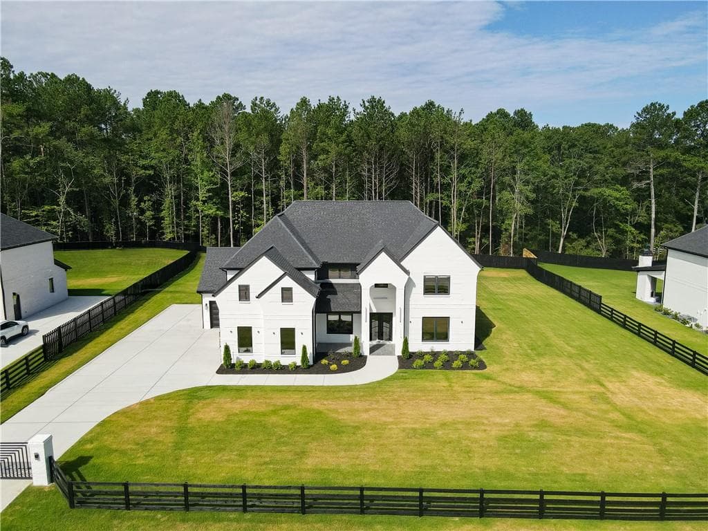 5 bedroom, 5 bathroom, 4,500 sq ft single family residence for sale at 5797 Orouke Rd, Sugar Hill, GA 30518 — photo 2