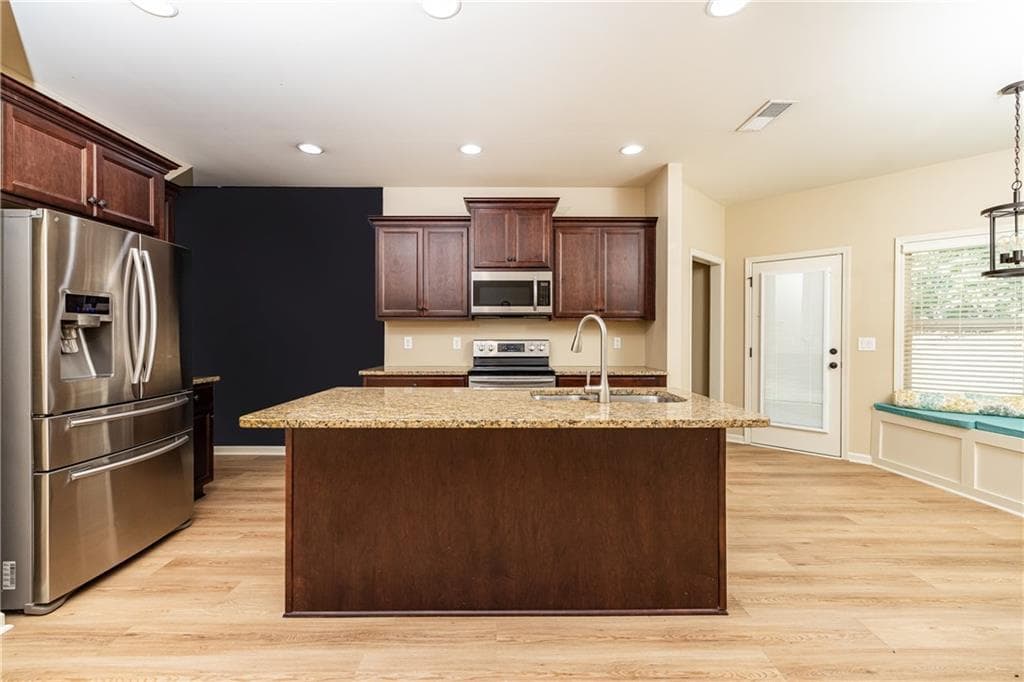 4 bedroom, 3 bathroom, 2,349 sq ft single family residence for sale at 1106 Blankets Creek Drive, Canton, GA 30114 — photo 10