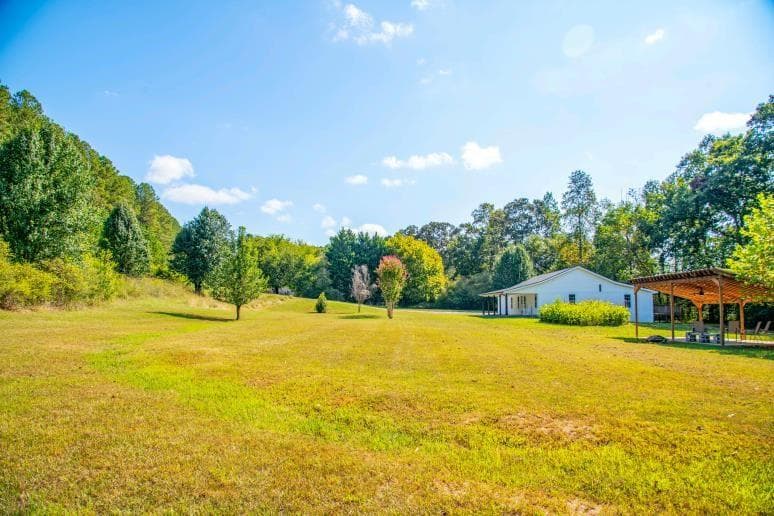 4 bedroom, 3 bathroom, 1,680 sq ft single family residence for sale at 2400 Flatbottom Road, Ball Ground, GA 30107 — photo 5