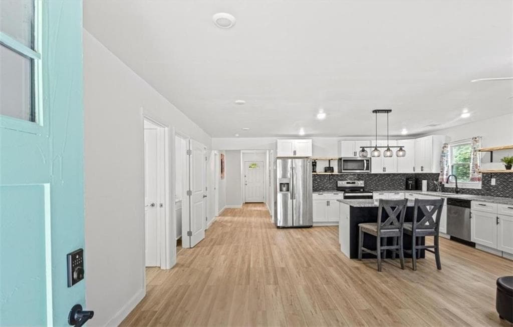 3 bedroom, 2 bathroom, 1,169 sq ft single family residence for sale at 1077 Peeples Street, Atlanta, GA 30310 — photo 2