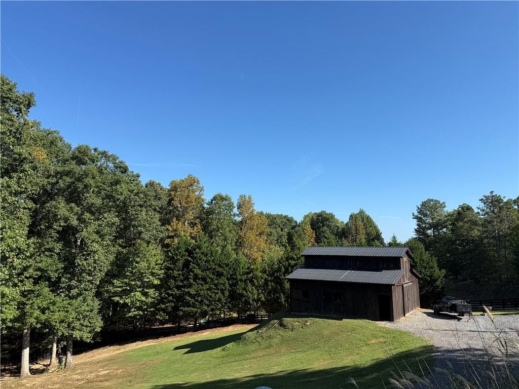 4 bedroom, 3 bathroom, 4,707 sq ft single family residence for sale at 1267 Mount Carmel Church Lane, Canton, GA 30114 — photo 6