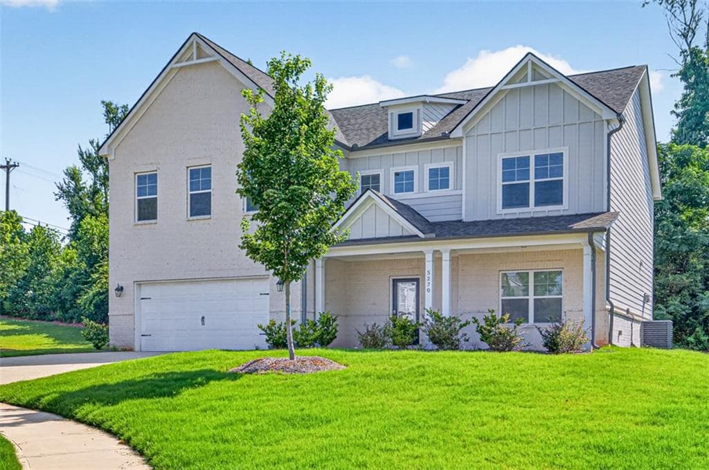4 bedroom, 3 bathroom, 3,114 sq ft single family residence for sale at 5270 Woodline View Circle, Auburn, GA 30011 — photo 2