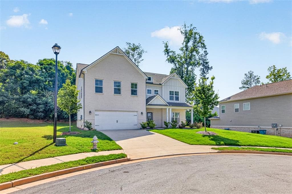 4 bedroom, 3 bathroom, 3,114 sq ft single family residence for sale at 5270 Woodline View Circle, Auburn, GA 30011 — photo 3